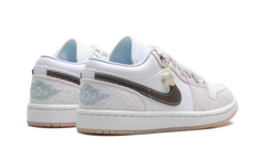Jordan 1 Low WMNS "Coral" IB8859 101